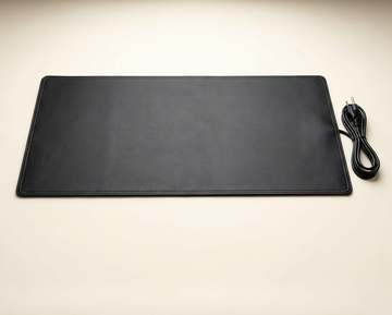 Lowtide grounding mat with cord, angled view
